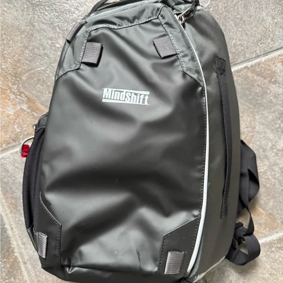 MindShift Gear PhotoCross 13 Sling Bag (Carbon Gray) Black Backpack. MindShift Gear PhotoCross 13 Sling Bag (Carbon Gray) Black Backpack.